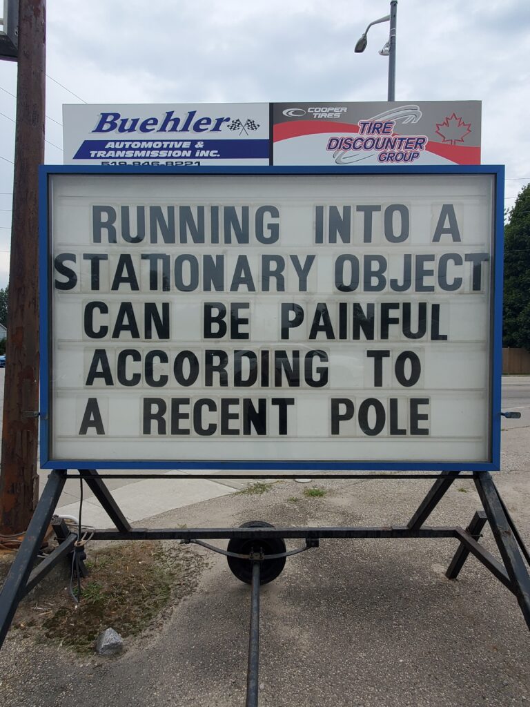 sign running into object